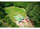 Aerial view of the recreation area with sports field, basketball court, playground and walking path at 210 Chiswick Close, Johns Creek, GA 30022