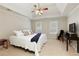 Bright bedroom featuring a bed with white linens and neutral walls at 210 Chiswick Close, Johns Creek, GA 30022