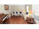 Bright and airy living room with hardwood floors, neutral walls, and comfortable seating at 210 Chiswick Close, Johns Creek, GA 30022