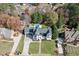 An aerial view of the property showcasing the pool, gazebo, landscaped grounds, and architectural details of the home at 2329 Walker Dr, Lawrenceville, GA 30043