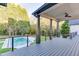 Covered deck overlooking backyard and swimming pool at 2329 Walker Dr, Lawrenceville, GA 30043