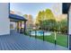 Covered deck overlooking backyard with an inground pool at 2329 Walker Dr, Lawrenceville, GA 30043