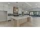 Spacious open-plan kitchen with large island, stainless steel appliances, and sleek cabinetry at 2329 Walker Dr, Lawrenceville, GA 30043