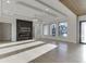 Modern living room with hardwood floors, statement fireplace, and natural light at 2329 Walker Dr, Lawrenceville, GA 30043
