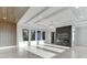 Bright, modern living room with hardwood floors and a sleek fireplace feature at 2329 Walker Dr, Lawrenceville, GA 30043