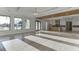 Spacious living area with hardwood floors flowing into a modern kitchen space at 2329 Walker Dr, Lawrenceville, GA 30043