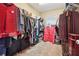 Walk-in closet featuring ample storage racks and rods for hanging clothing at 1527 Sage Ridge Dr, Marietta, GA 30064