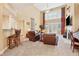 Living room featuring cathedral ceiling, hardwood floors, fireplace and large windows at 1527 Sage Ridge Dr, Marietta, GA 30064