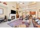 Spacious living room with fireplace, high ceilings, and abundant natural light at 1527 Sage Ridge Dr, Marietta, GA 30064