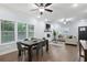 Stylish dining area filled with natural light, flowing seamlessly into the cozy living room and providing great views at 257 Birch St, Atlanta, GA 30354