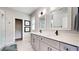 Bathroom with double sinks, modern fixtures, and a neutral color palette at 5728 Williams Rd, Norcross, GA 30093