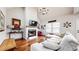 Bright living room with fireplace, chandelier, and comfortable seating at 5728 Williams Rd, Norcross, GA 30093