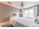 Bedroom with plush bedding, a gray rug, and a window with natural light at 970 Sidney Marcus Blvd # 1217, Atlanta, GA 30324