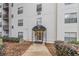Apartment building entrance with covered walkway and detailed trim at 970 Sidney Marcus Blvd # 1217, Atlanta, GA 30324