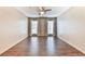 Expansive bedroom with wood-look flooring and two windows with blinds, providing a bright and inviting space at 808 Riverview Se Dr, Marietta, GA 30067