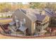 Exterior view of townhome and patio with fencing, siding and lush landscaping at 808 Riverview Se Dr, Marietta, GA 30067