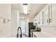 Updated kitchen with stainless steel appliances and white cabinets at 808 Riverview Se Dr, Marietta, GA 30067