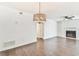 Open living room with fireplace and hardwood floors at 808 Riverview Se Dr, Marietta, GA 30067