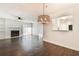 Living room with fireplace, slider, and kitchen passthrough at 808 Riverview Se Dr, Marietta, GA 30067
