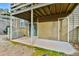 Private patio space with storage, sliding doors, and backyard access at 808 Riverview Se Dr, Marietta, GA 30067