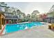 A community pool with cabanas and lush landscaping at 808 Riverview Se Dr, Marietta, GA 30067