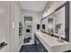 Stylish bathroom featuring a double vanity, modern fixtures, and neutral decor at 532 Rivercrest Dr, Woodstock, GA 30188