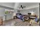 Cozy bedroom with natural light features wood-look floors and neutral paint at 532 Rivercrest Dr, Woodstock, GA 30188