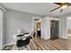 Kitchen with white cabinets and stainless steel appliances with an adjacent breakfast nook at 532 Rivercrest Dr, Woodstock, GA 30188