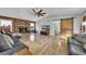 Bright living room with cozy fireplace and barn door, blending rustic details with modern comforts at 532 Rivercrest Dr, Woodstock, GA 30188