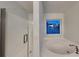 Bright bathroom with soaking tub and a separate glass enclosed shower at 634 Sandpiper Cv, Stockbridge, GA 30281
