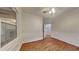 Bright bedroom features wood-look floors, ceiling fan and classic molding accents at 634 Sandpiper Cv, Stockbridge, GA 30281