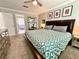 Bedroom featuring a queen size bed and an ensuite bath with modern fixtures at 1002 River Plantation Drive, Woodstock, GA 30188
