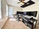 Carpeted home studio with recording equipment, acoustic dampeners, and natural light at 1002 River Plantation Drive, Woodstock, GA 30188