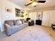Inviting living room showcases a comfortable sofa, recliner, and closet for storage at 1002 River Plantation Drive, Woodstock, GA 30188