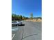 Ample parking space with designated accessible parking spot in the community parking lot at 1002 River Plantation Drive, Woodstock, GA 30188