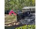 Community playground and picnic area with tables, perfect for Gathering gatherings and outdoor fun at 1002 River Plantation Drive, Woodstock, GA 30188