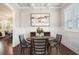 Formal dining room with wainscoting, chandelier, and modern decor at 3139 Hilltop Dr, Marietta, GA 30066