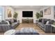 Recreation room featuring two sofas, a large television, and stylish decor at 3139 Hilltop Dr, Marietta, GA 30066