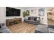 Cozy living room with a large-screen TV, comfortable seating, and modern decor at 3139 Hilltop Dr, Marietta, GA 30066