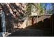 Outdoor patio space surrounded by brick walls and various plants at 3338 York Pl, Decatur, GA 30032