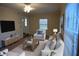 Inviting living room with a sofa, armchairs, and neutral tones, creating a relaxing atmosphere at 3338 York Pl, Decatur, GA 30032