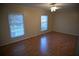 Bright and spacious room with hardwood floors and two windows at 3338 York Pl, Decatur, GA 30032