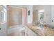 Bathroom with granite countertop, white vanity and tile shower at 948 Saint Lyonn Cts, Marietta, GA 30068