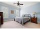 Comfortable bedroom with neutral tones, shuttered windows and classic trim detail at 948 Saint Lyonn Cts, Marietta, GA 30068