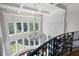Second floor foyer with chandelier and large windows at 948 Saint Lyonn Cts, Marietta, GA 30068