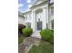 A stately home boasts manicured landscaping, a walkway to the entrance, and an inviting entryway at 948 Saint Lyonn Cts, Marietta, GA 30068