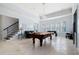 Spacious game room with pool table, foosball, and wet bar making it perfect for entertaining at 948 Saint Lyonn Cts, Marietta, GA 30068