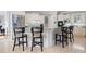 Kitchen featuring white cabinetry, granite countertops, stainless steel appliances, and a breakfast bar at 948 Saint Lyonn Cts, Marietta, GA 30068