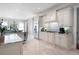 Spacious kitchen with white cabinets, stainless steel appliances, and tile flooring at 948 Saint Lyonn Cts, Marietta, GA 30068