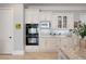 Close up of kitchen with built-in oven, and white cabinetry at 948 Saint Lyonn Cts, Marietta, GA 30068